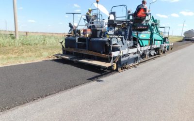 Coughlin Company repaving a rural road with recycled asphalt pavement.